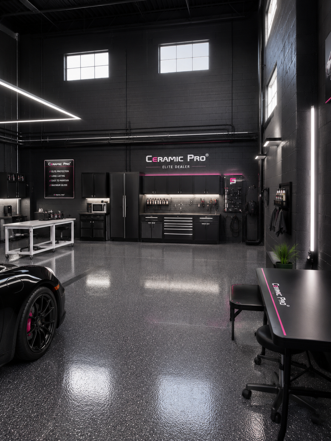 Ceramic Pro Fuel House detail bay — polished-concrete floor, Elite Dealer wall signage, climate-controlled studio