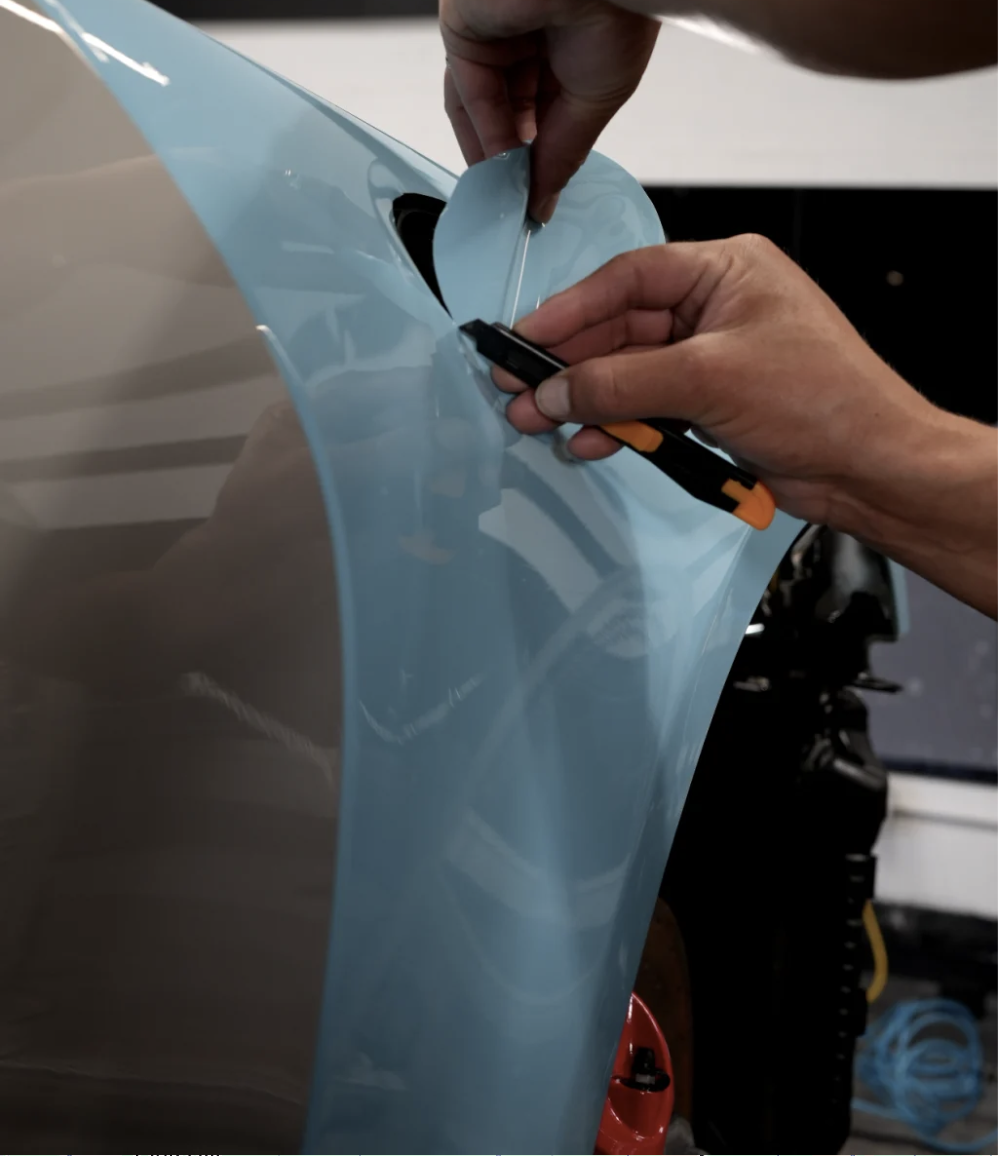 Paint protection film being installed on a vehicle at Ceramic Pro Fuel House, serving Shawnee KS