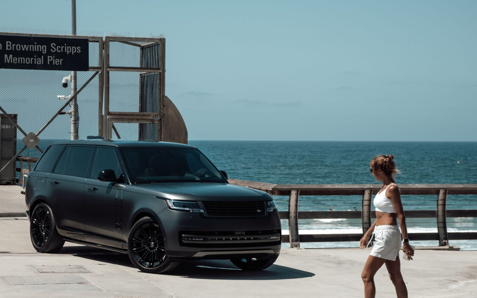 Matte PPF — matte black Range Rover at the beach